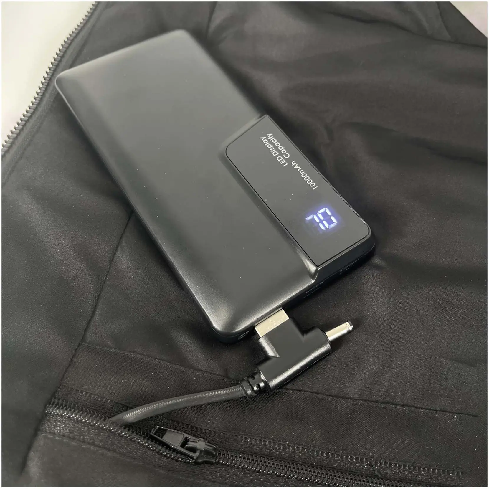 Bild på SCX.design G01 uppvärmd väst med powerbank