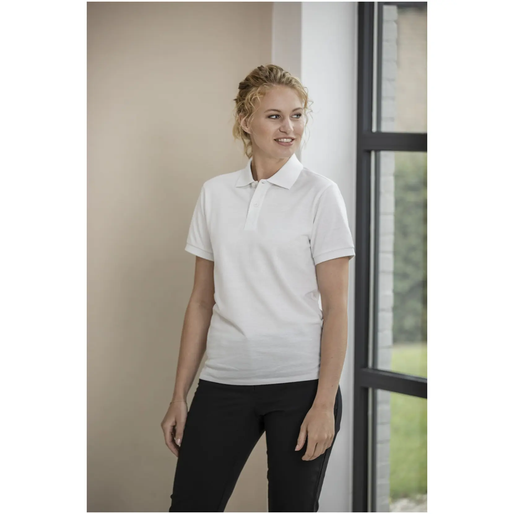 Bild på Emerald kortärmad unisex Aware™-återvunnen piké Bild på Emerald kortärmad unisex Aware™-återvunnen piké