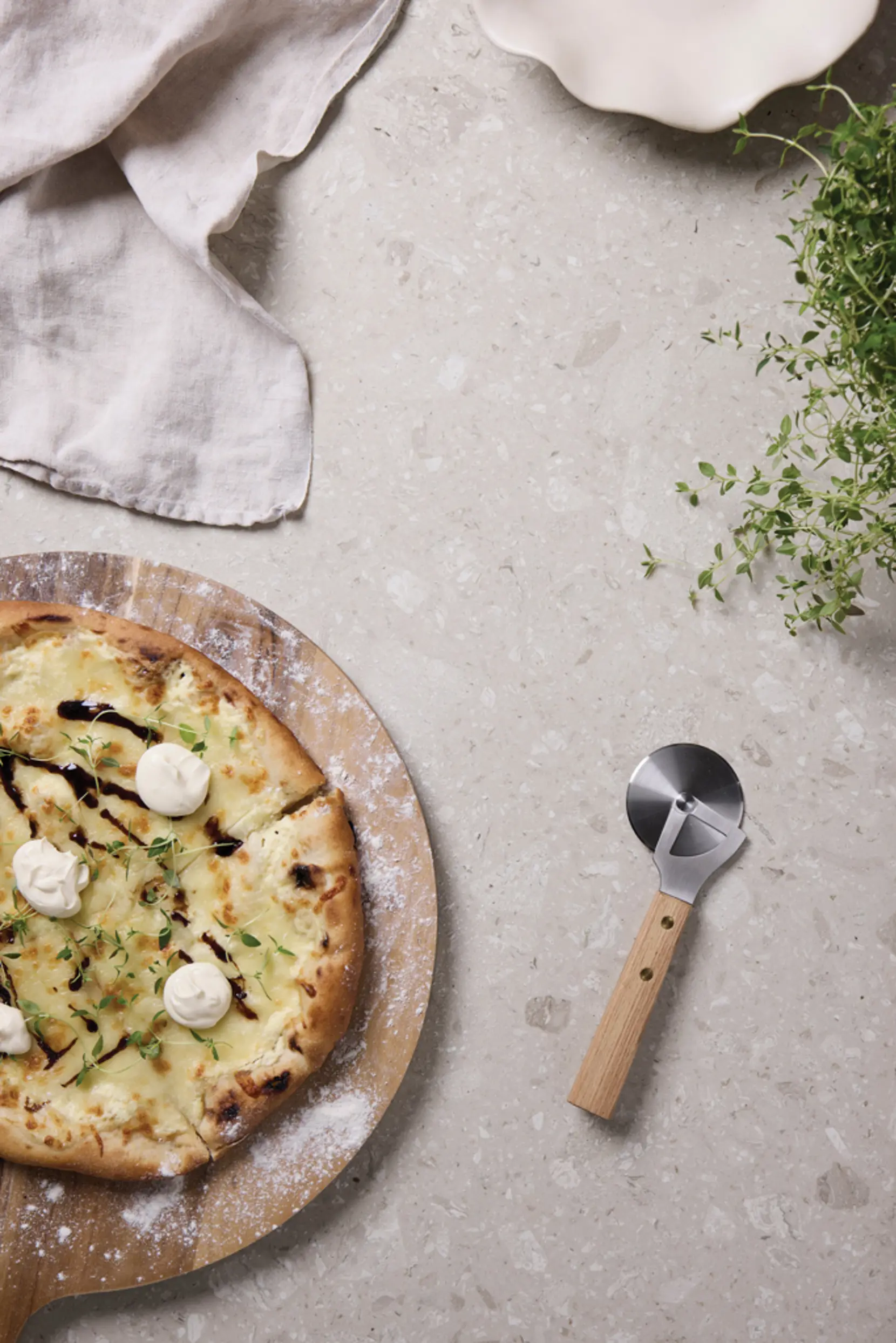Bild på VINGA Paso pizzaskärare