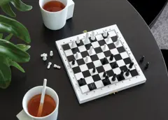 Bild på 3-i-1 brädspel i trälåda