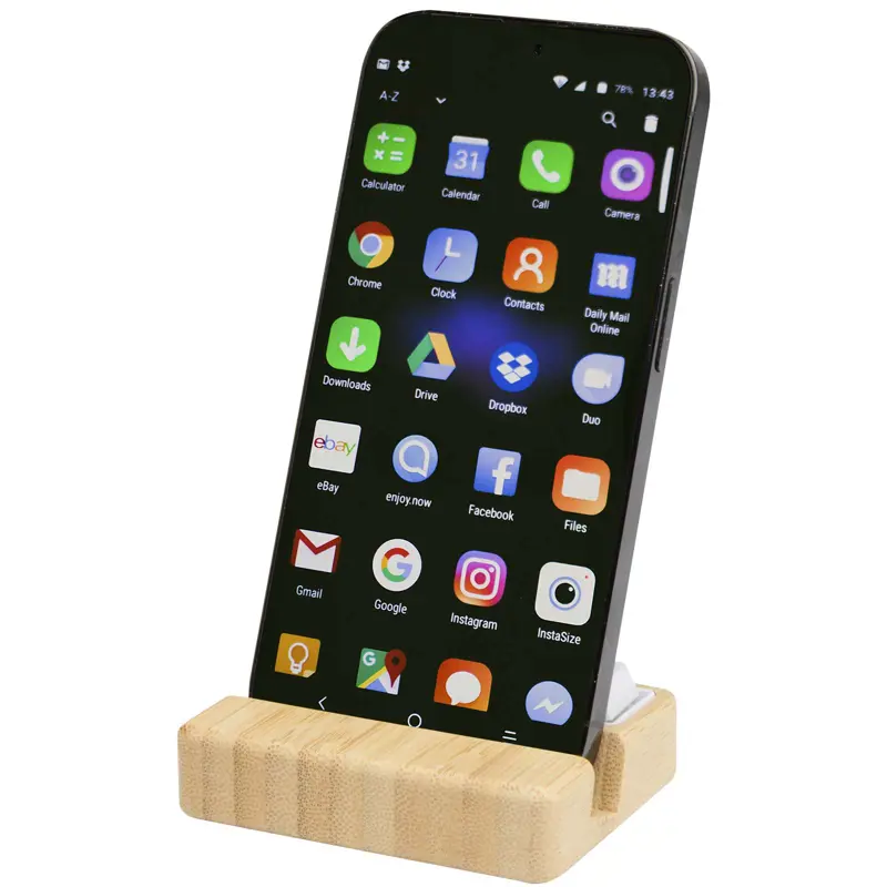 Bild på Algol telefonställ och fidget-leksak av återvunnen plast med detaljer i bambu