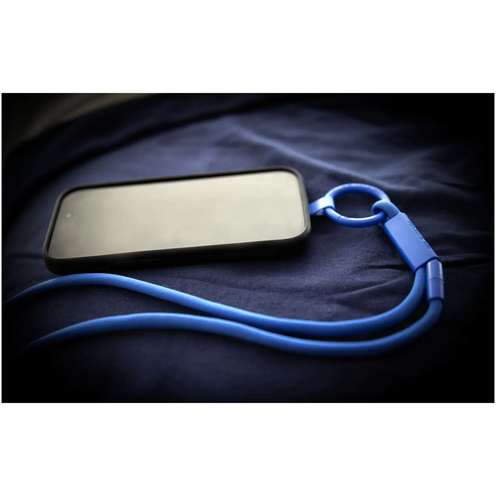 Bild på Tubyard logoband med telefonhållare och elastiskt rör av återvunnen plast Bild på Tubyard logoband med telefonhållare och elastiskt rör av återvunnen plast